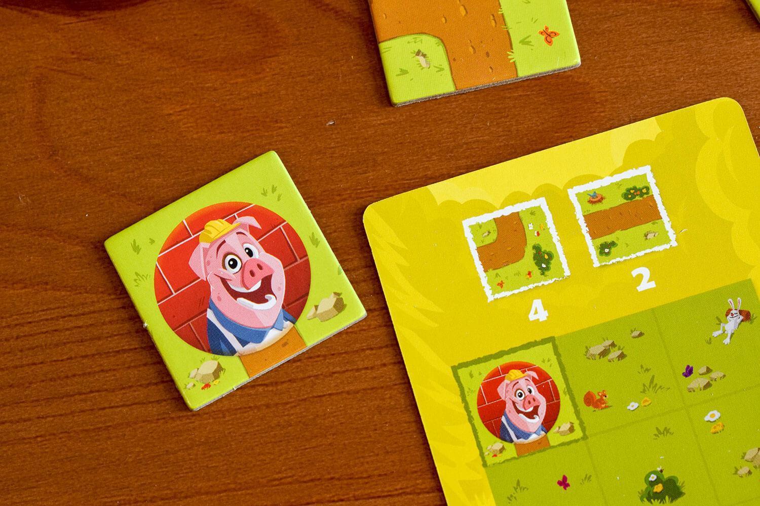 blue-orange-casse-t-te-pig-puzzle-jeu-parcours-cochons image 2